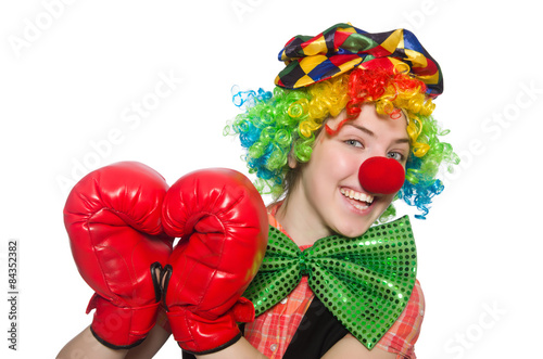Female clown with box gloves isolated on white
