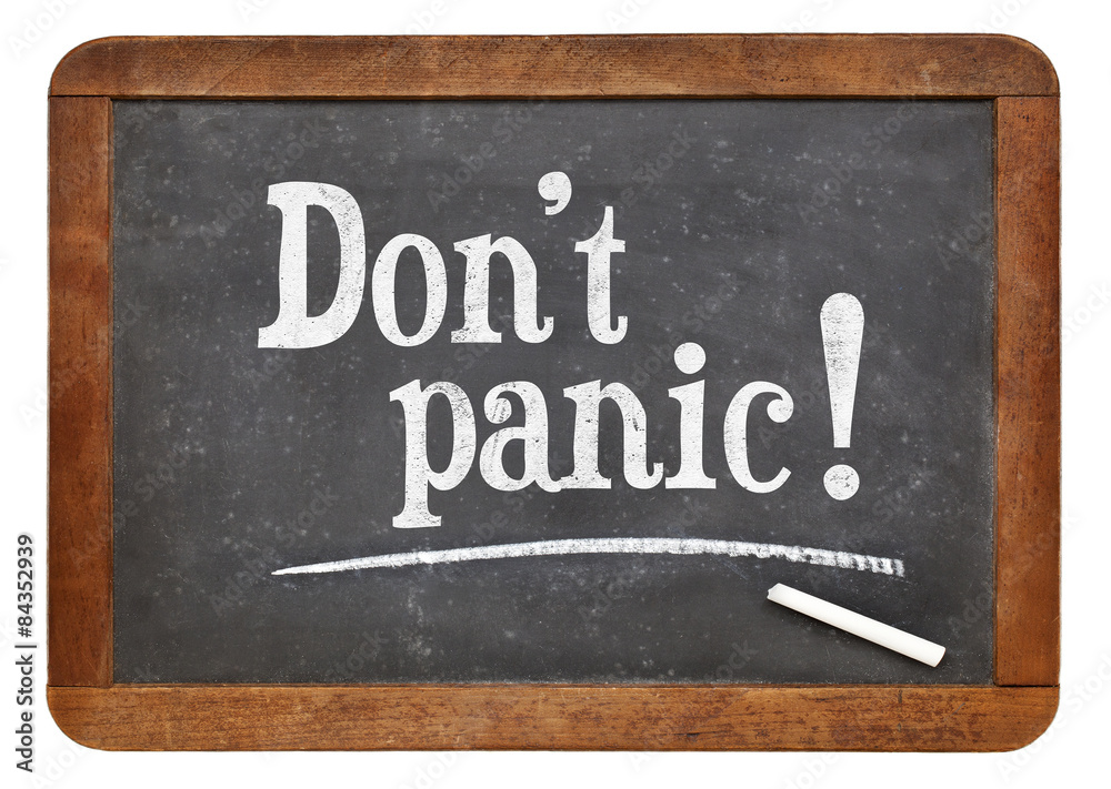 Obraz premium Do not panic - text on blackboard