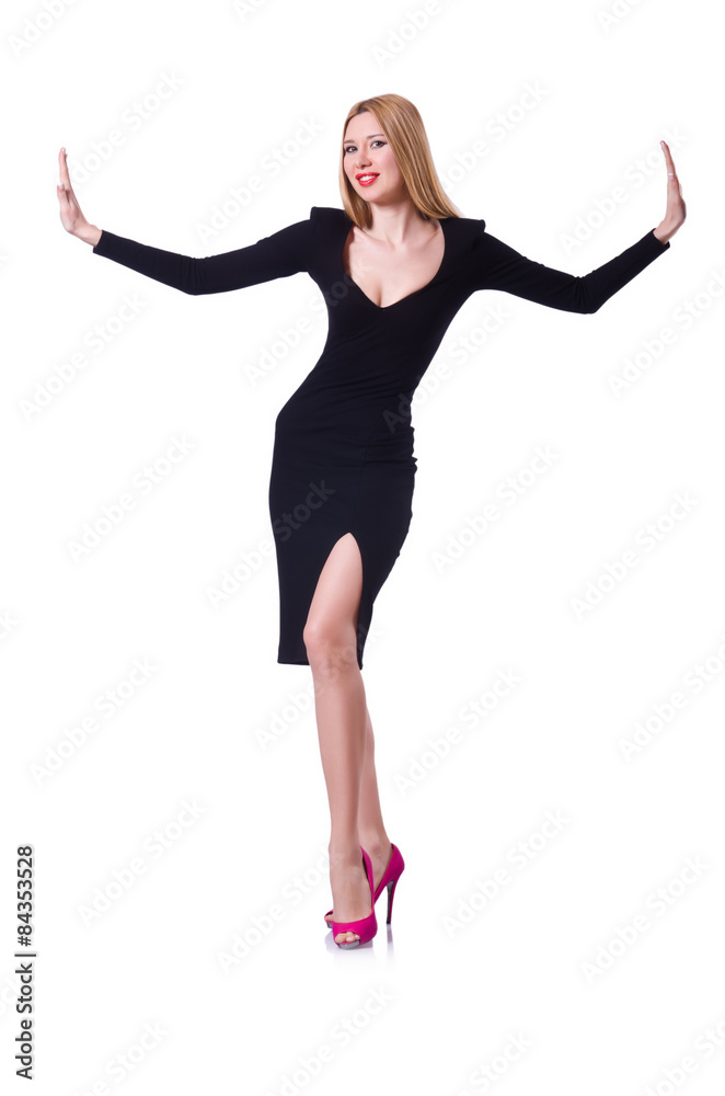 Young blonde girl in black dress pushing isolated on white Young blonde girl in black dress pushing isolated on white