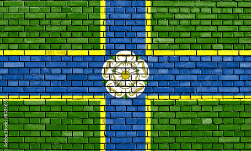 flag of North Riding painted on brick wall photo
