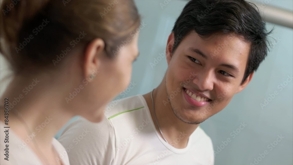 Couple Cleans Teeth Man And Woman Together In Bathroom Couple Cleans Teeth Man And Woman Together In Bathroom