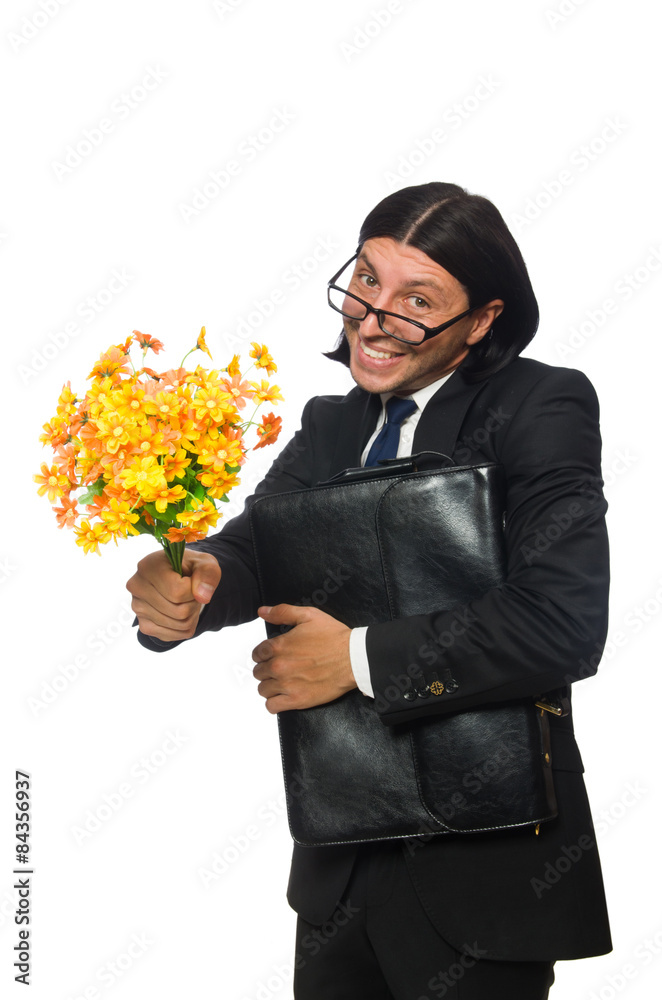 Handsome businessman with flower and brief case isolated on