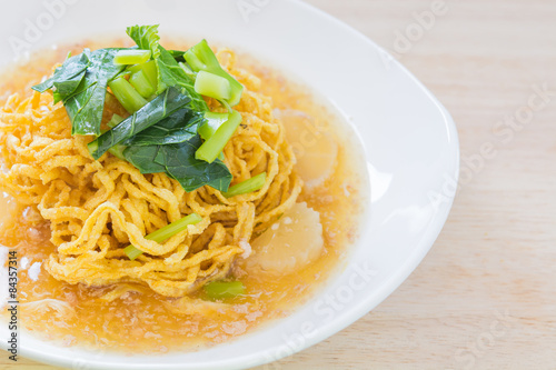 Pan fried noodles with pork.