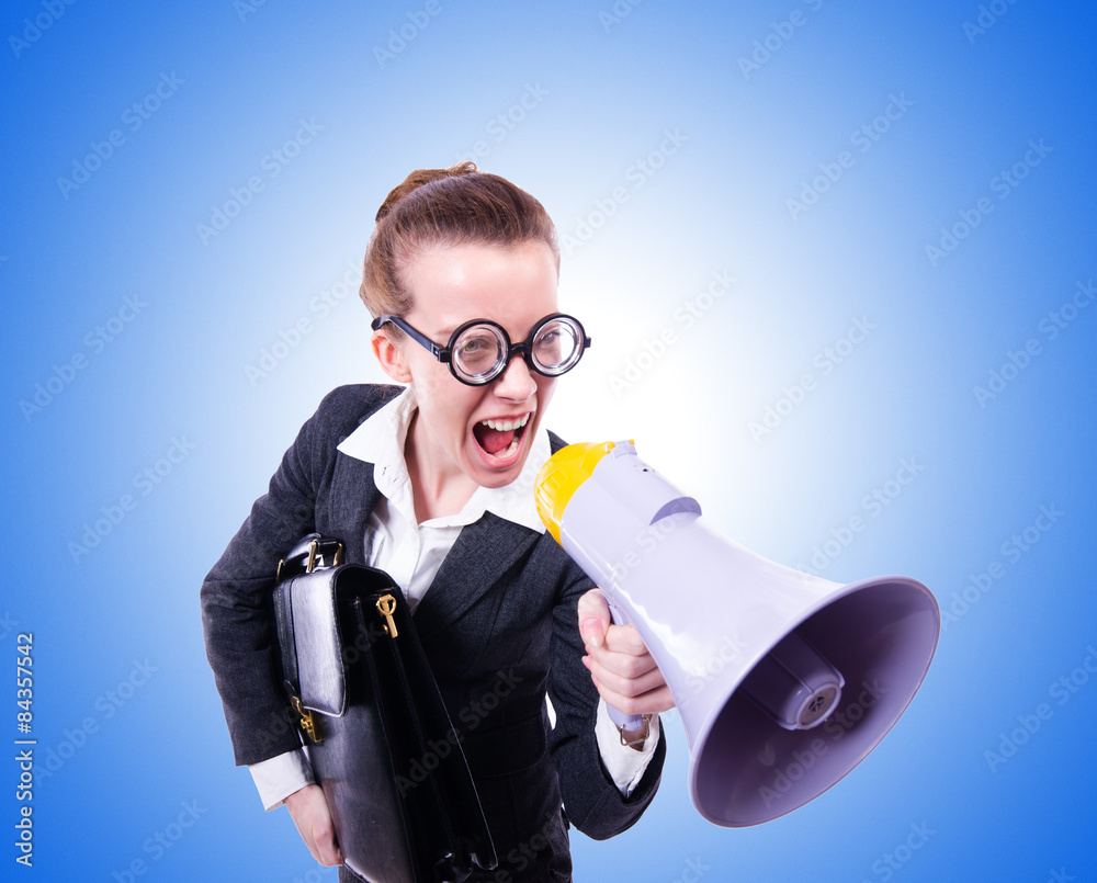 Young businessman with loudspeaker on white Young businessman with loudspeaker on white