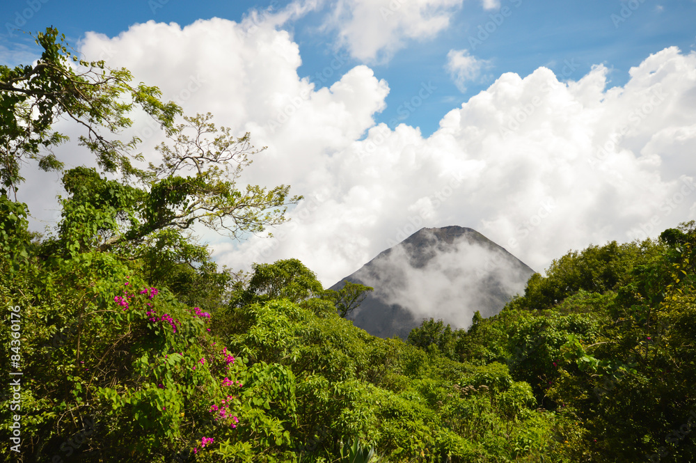 The peak of the active and young Izalco volcano covered by clouds in El Salvador. Central America The peak of the active and young Izalco volcano covered by clouds in El Salvador. Central America