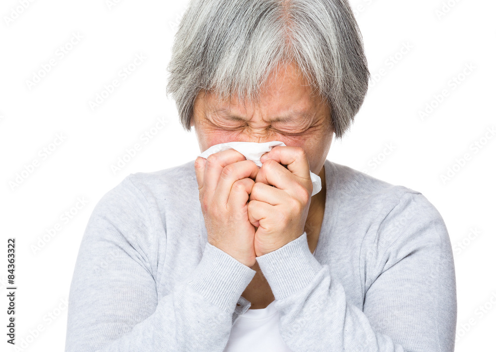 Senior woman with nose allergy Senior woman with nose allergy