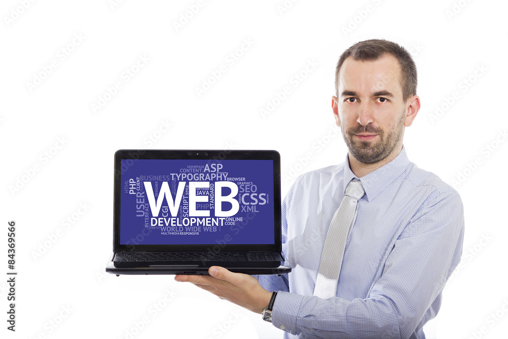 Businessman holding Laptop with Web Development concept Businessman holding Laptop with Web Development concept