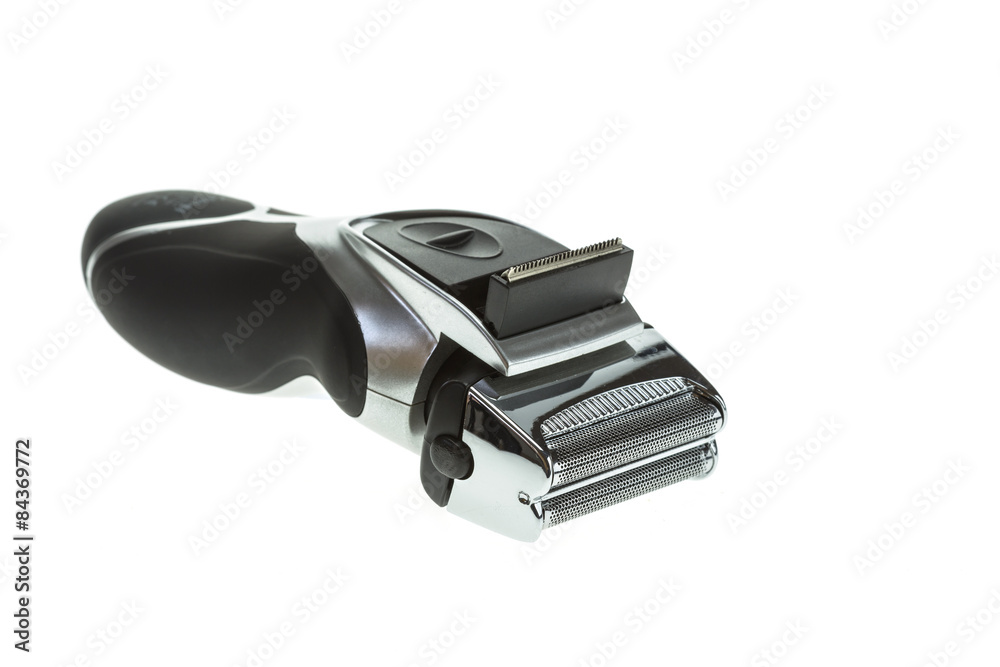 Close up mens black electric shaver isolated on white Close up mens black electric shaver isolated on white