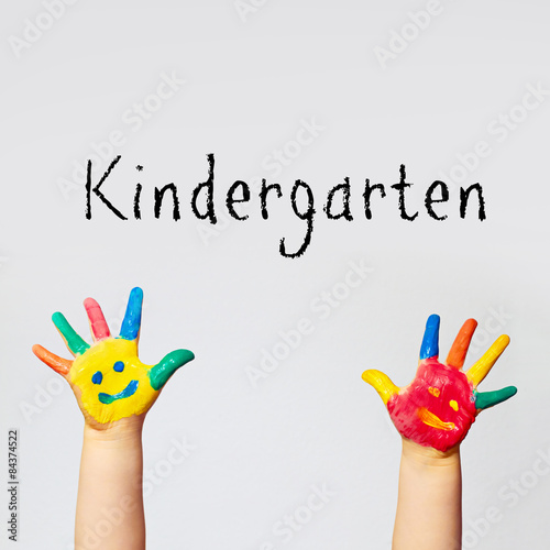 painted hands of little child - kindergarten