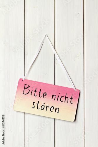 sign on white wood wall - greeting card background
