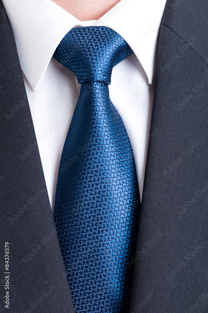 Black suit, white shirt and blue tie Stock Photo | Adobe Stock