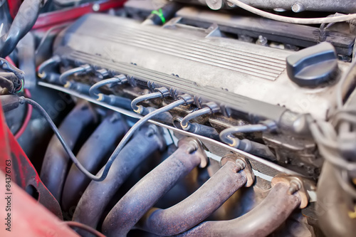 Close-up of old sports 6-cylinder car engine