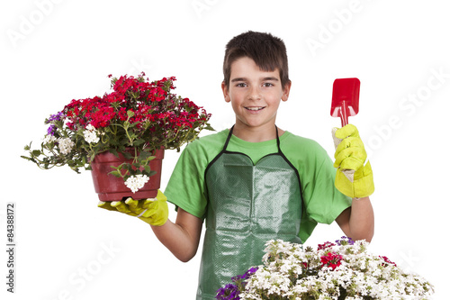 child with garden plants isolated on white photo