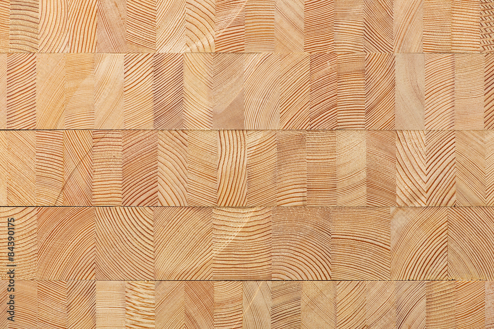 Background with glued larch wooden blocks.