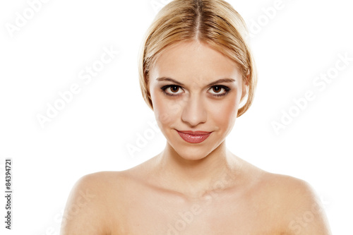 smiling beautiful young woman on a white background