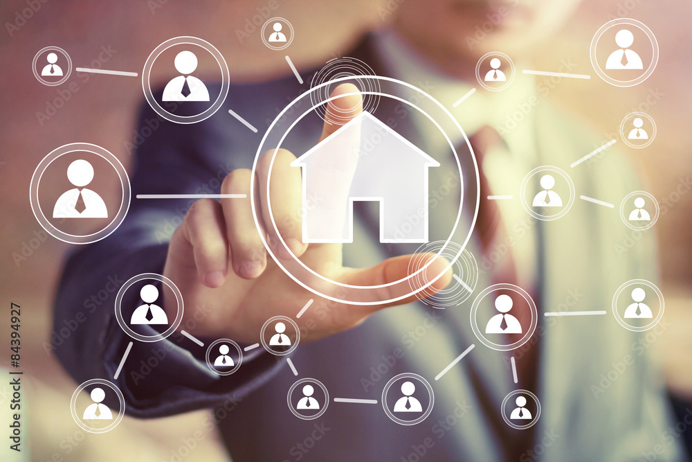 Man with touchscreen house web icon Man with touchscreen house web icon