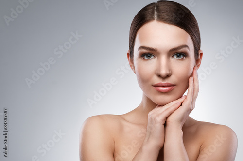 Young woman with beautiful face and soft skin
