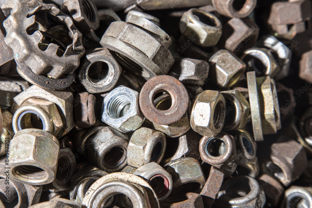 Detail of different metallic bolts and nuts Detail of different metallic bolts and nuts