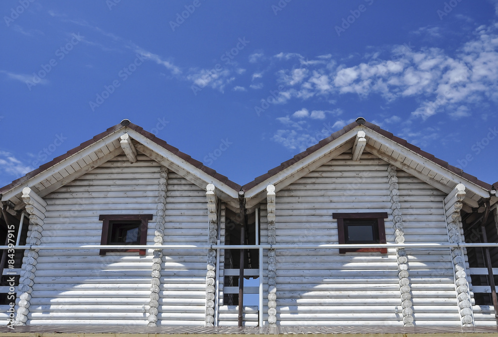 Two wooden cabins