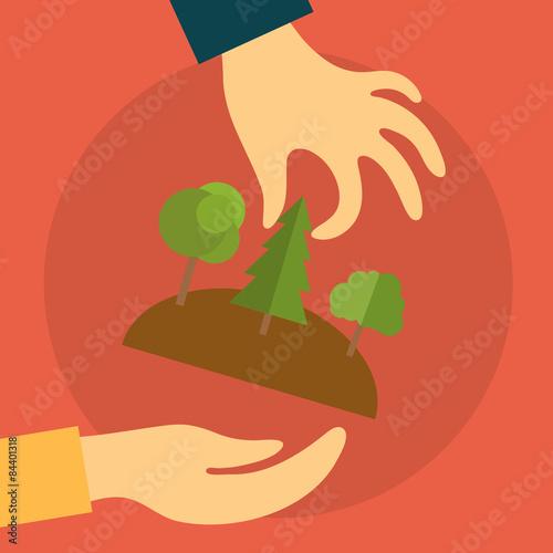 Hand of a realtor extends to the purchaser of land