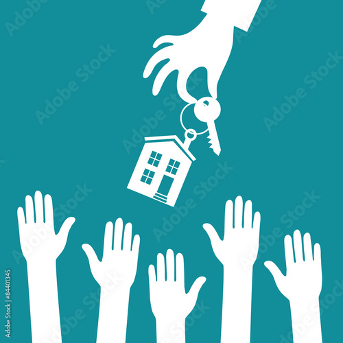 Hand real estate agent holding holds a key with a tag in the