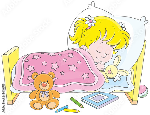 Little girl sleeping in her...