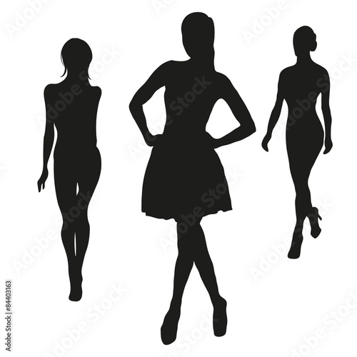 Three black silhouettes of women