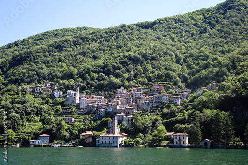 Beautiful town in the mountains on the lake © Anna Issakova