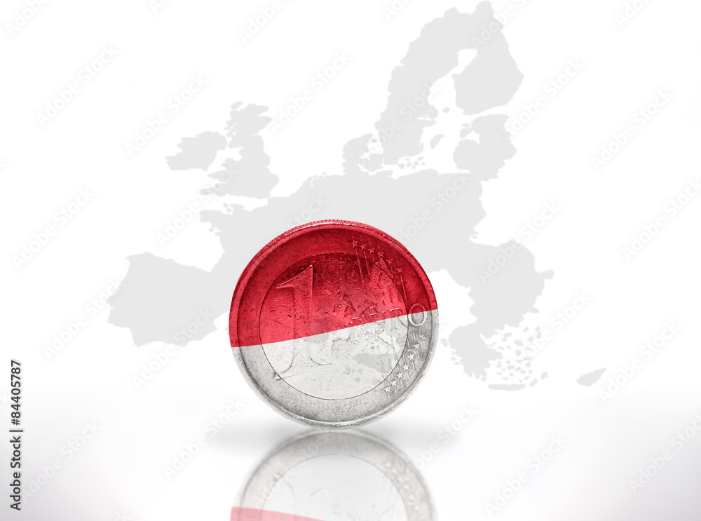 Naklejka premium euro coin with indonesian flag on european union map background