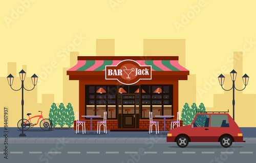 Outside view of cafe. Car and bicycle outide