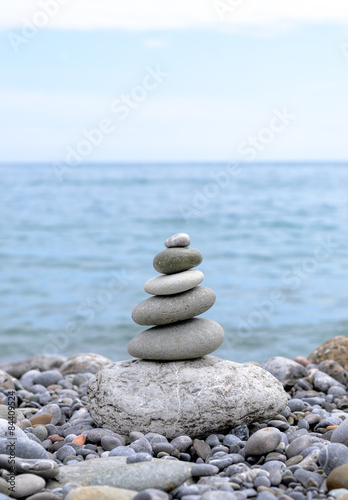 Stack of Stones Near the Beautiful Blue Ocean