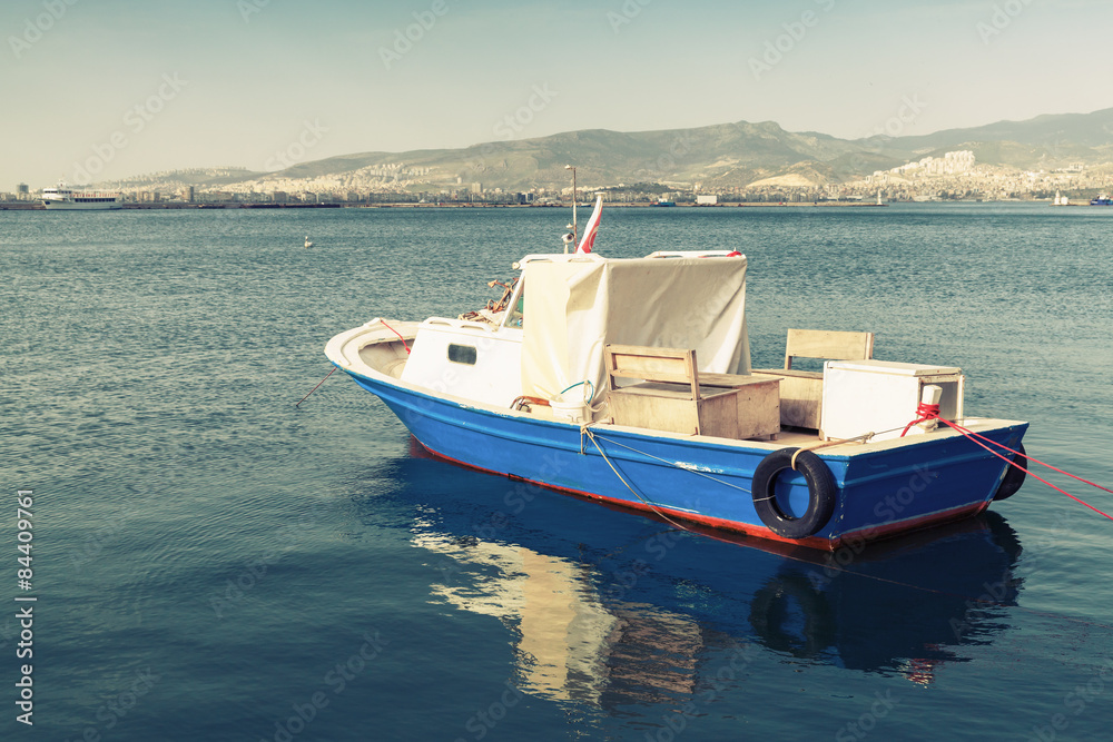 Old wooden pleasure boat anchored in Izmir bay