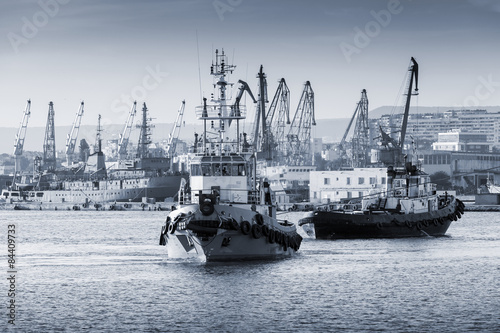 Tug boats are working in Varna harbor. Black Sea
