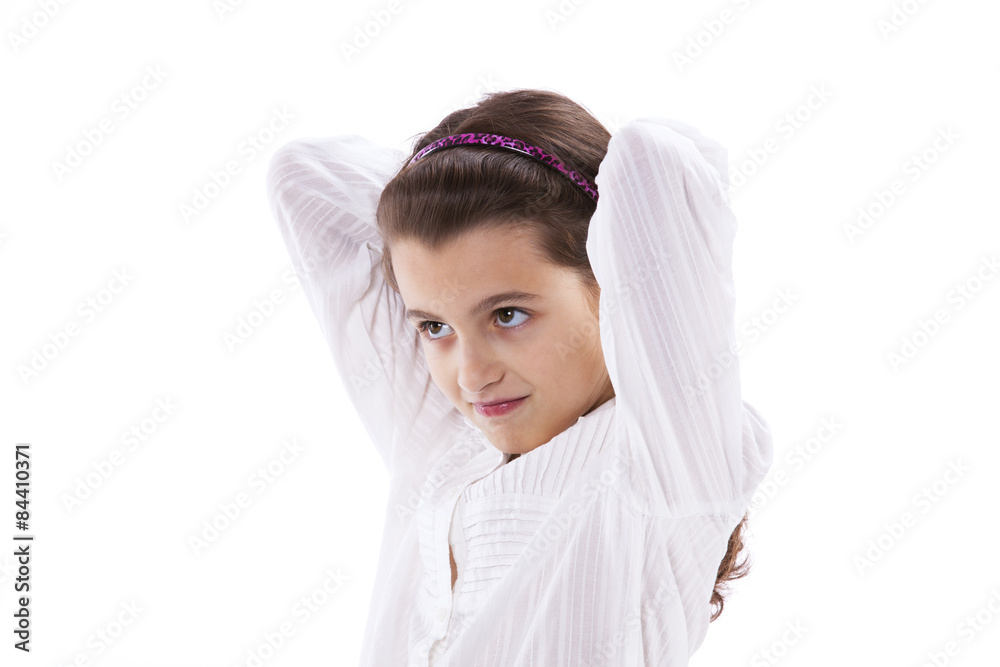 Little girl with her hands on her hair Little girl with her hands on her hair