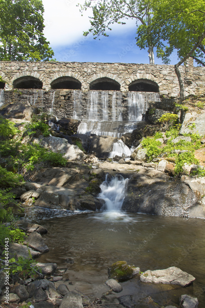 Stone bridge at Highland Park Falls in Manchester, Connecticut. Stone bridge at Highland Park Falls in Manchester, Connecticut.