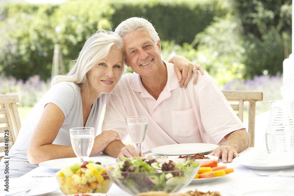 Senior couple enjoying al fresco meal Senior couple enjoying al fresco meal