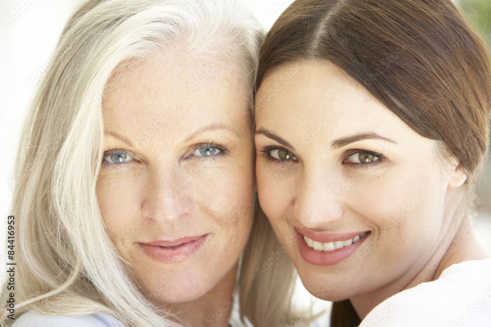 Portrait Of Mature Mother Relaxing With Grown Up Daughter Portrait Of Mature Mother Relaxing With Grown Up Daughter