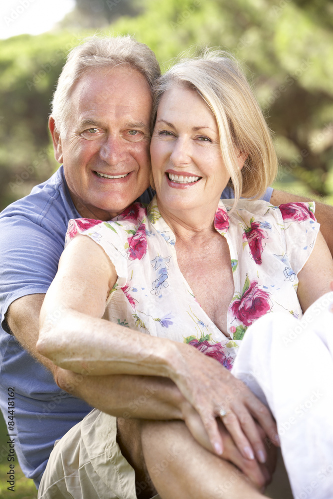 Portrait Of Senior Couple Relaxing In Countryside Portrait Of Senior Couple Relaxing In Countryside
