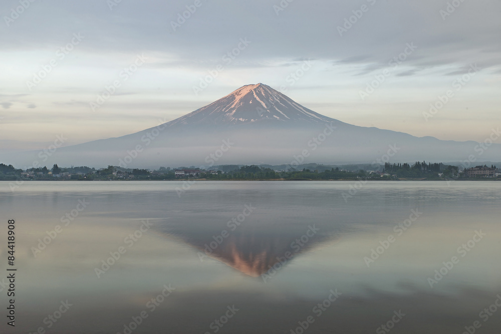 Mount Fuji reflected in Lake Kawaguchiko at dawn, Japan.