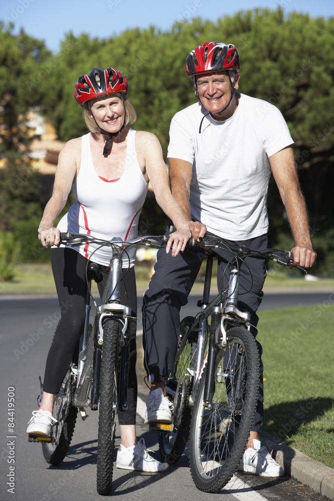Senior Couple On Cycle Ride Together