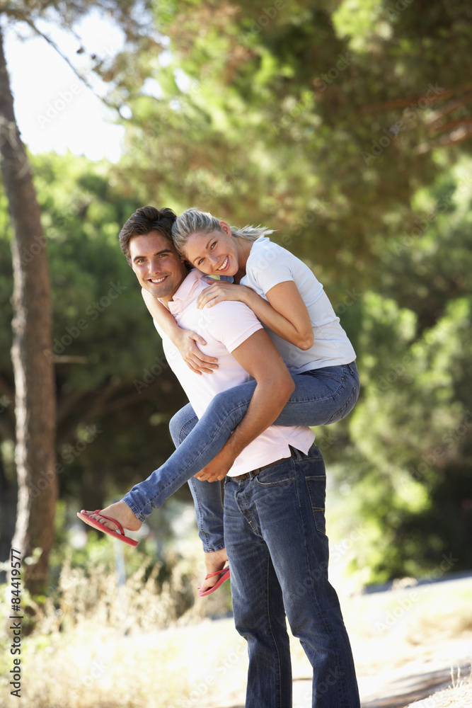 Young Couple Having Fun On Countryside Walk Young Couple Having Fun On Countryside Walk