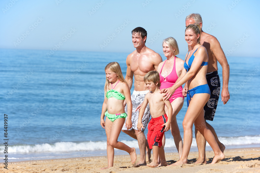 Portrait Of Three Generation Family On Beach Holiday Portrait Of Three Generation Family On Beach Holiday