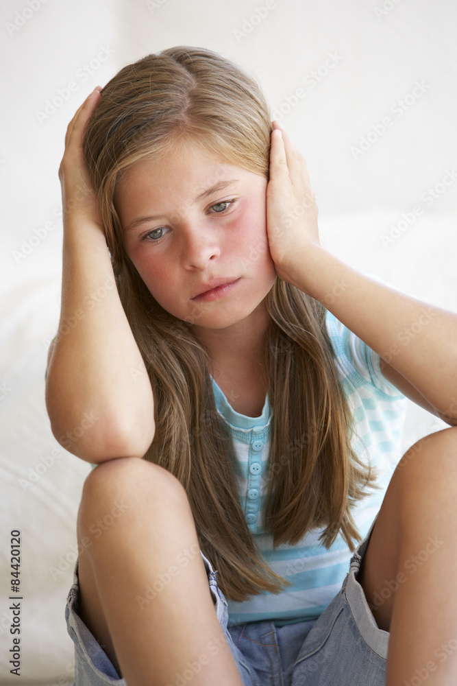 Portrait Of Unhappy Young Girl At Home Portrait Of Unhappy Young Girl At Home