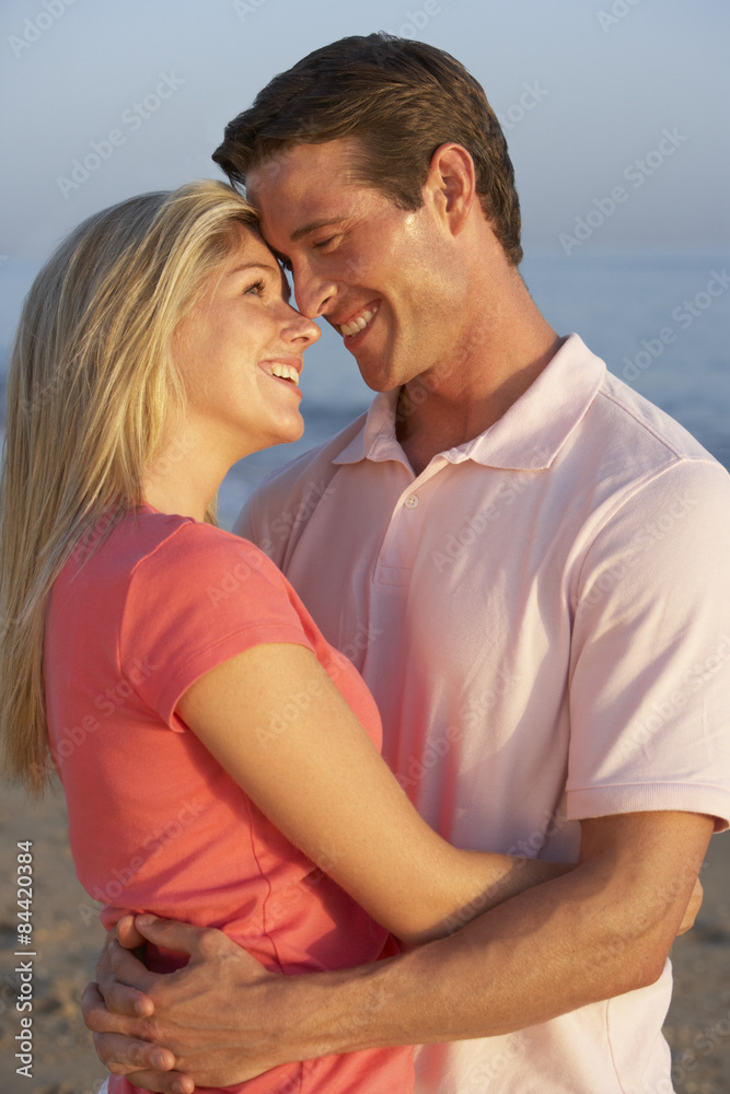 Romantic Young Couple Enjoying Beach Holiday Romantic Young Couple Enjoying Beach Holiday