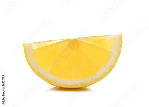 Slice of fresh lemon isolated on white background