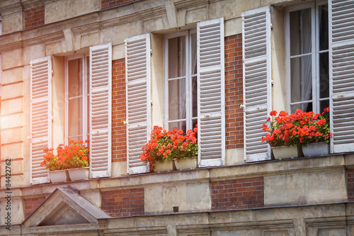 Classic style balcony with flowers at summer time