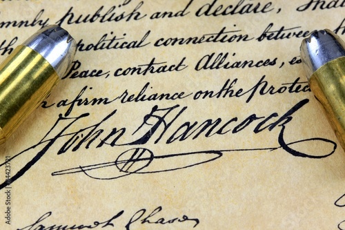 Ammunition on US Constitution John Hancock's signature  - The Right to Bear Arms