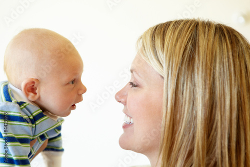 Mother talking to baby