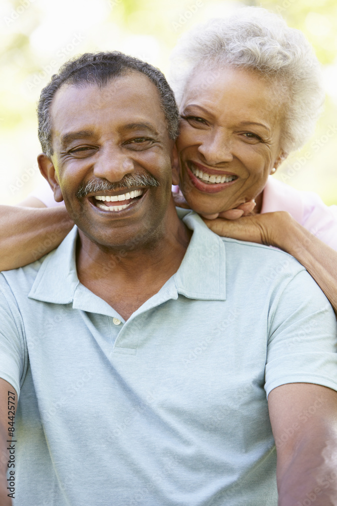 Portrait Of Romantic Senior African American Couple In Park Portrait Of Romantic Senior African American Couple In Park