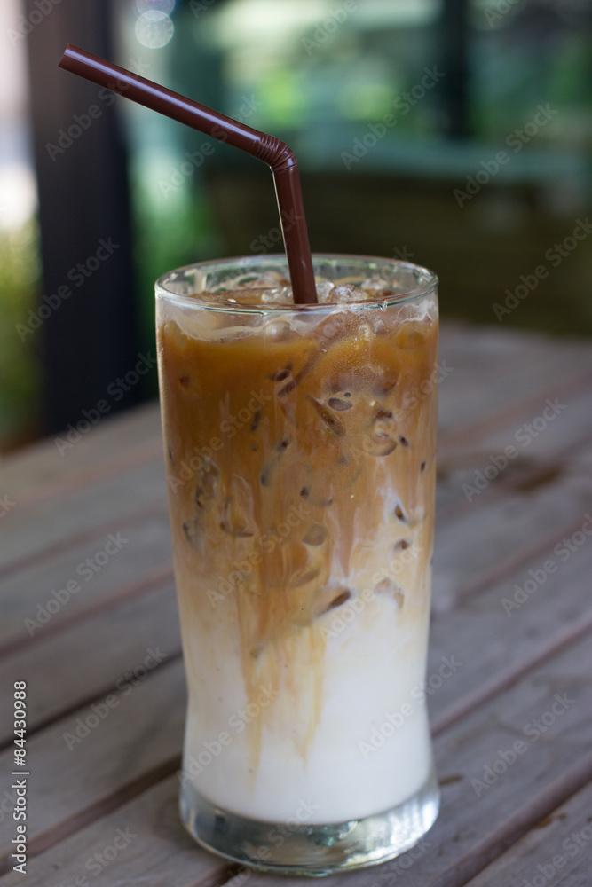 Iced coffee with milk is on the table. Iced coffee with milk is on the table.